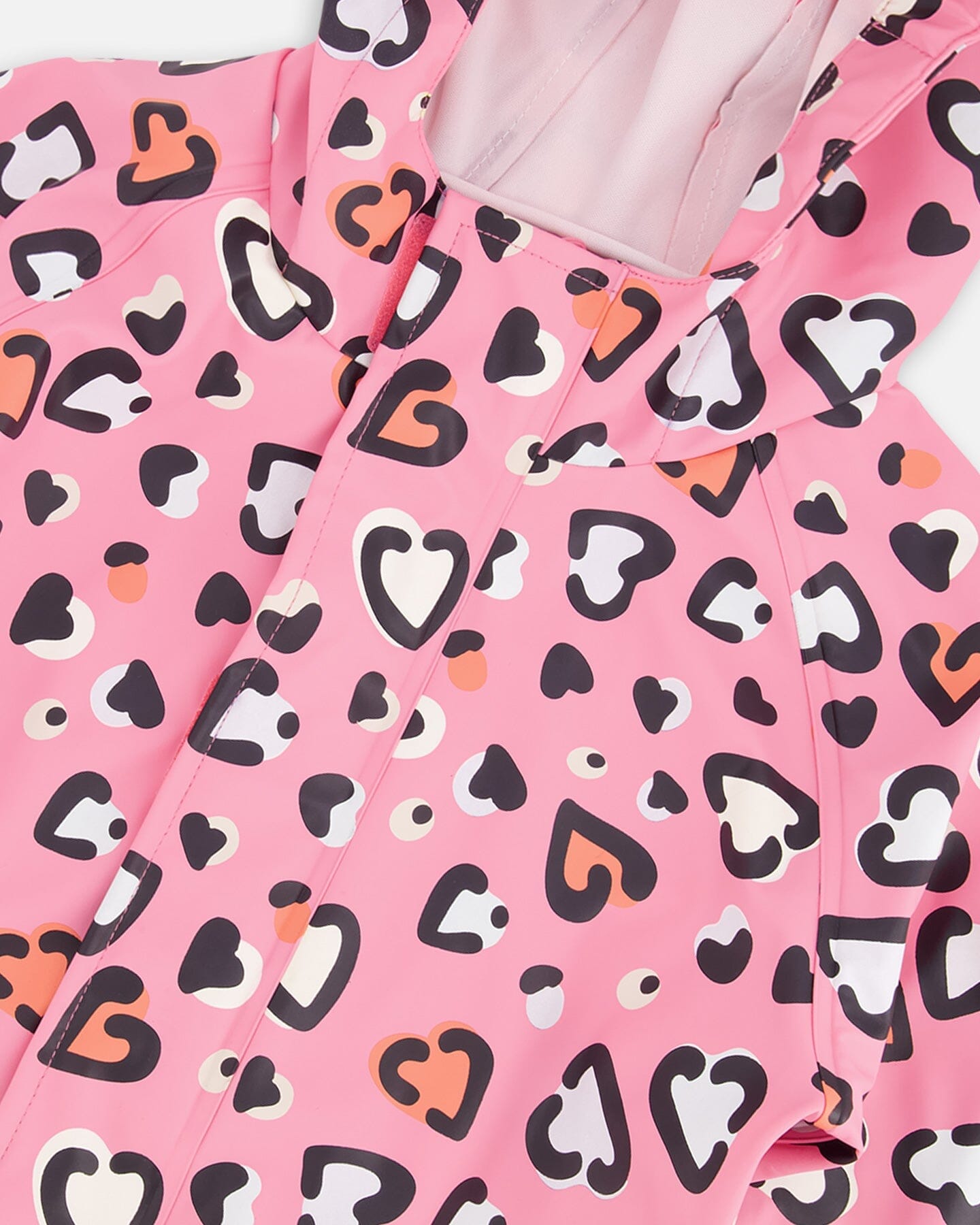 Pink rain jumpsuit with color-changing hearts print - Image 5