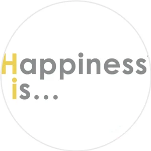 Happiness Is logo featuring minimalist gray and yellow text reading “Happiness is…” on a white background, symbolizing positivity and mindfulness.