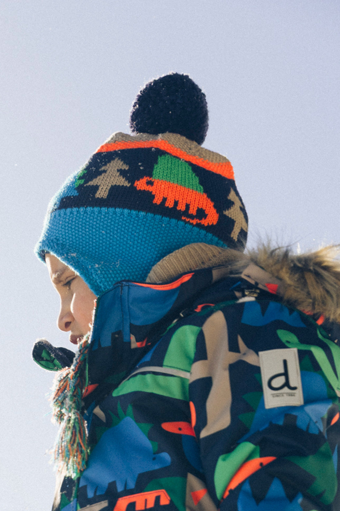 Winter Peruvian Knit Hat With Pompom Blue Dinosaur Print - Image 2