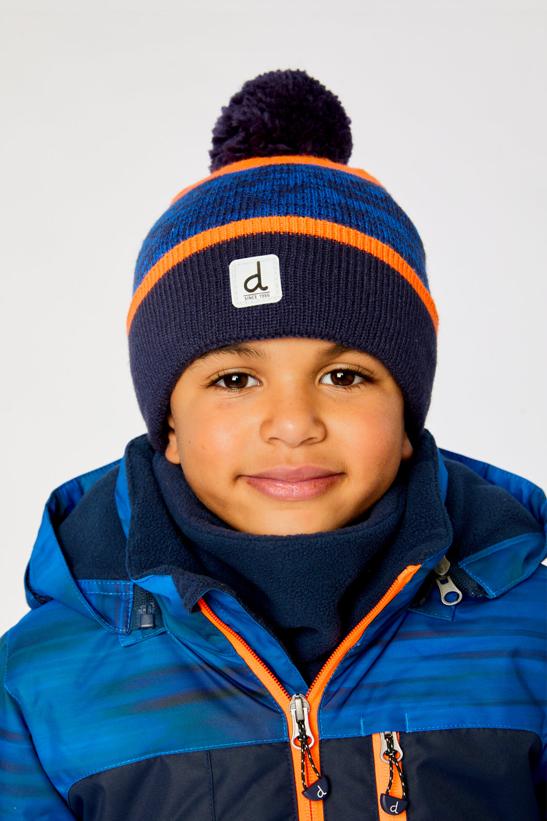Winter Knit Hat With Pompom Color Block Orange And Blue - Image 2