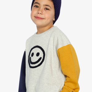 Deux par Deux fleece sweatshirt in heather grey with yellow and blue colorblock raglan sleeves and smiley face graphic